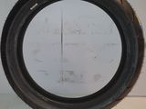 a close up of a tire tire on a white surface