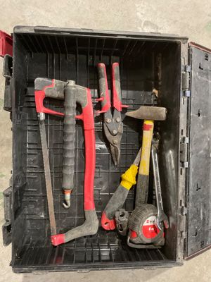 a box with tools in it on the floor