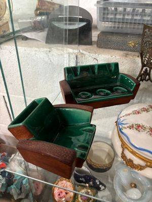 a glass display case filled with assorted items