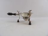 an antique silver plated coffee pot with a handle and a handle