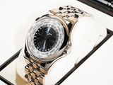 a watch that is sitting in a box on a table