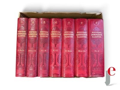 six red books in a cardboard box on a white background