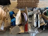 a suitcase full of assorted items sitting on the floor