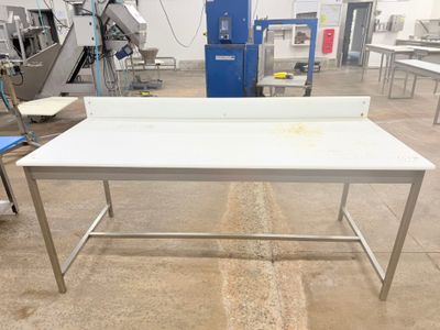 a table that is sitting in the middle of a room
