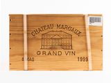 a wooden box with a label on it that says chateau margaux grand vin