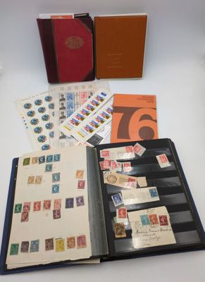 a lot of stamps in a folder on the table