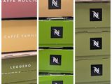 several boxes of coffee are stacked on top of each other