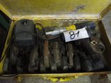 a box full of tools that are sitting on the floor