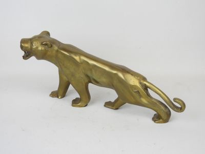 brass figurine of a tiger on a white background