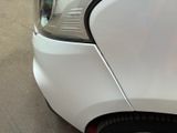 a close up of a car ' s headlight and tail light