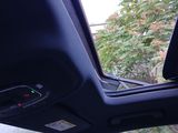 a view of the inside of a car from inside the vehicle