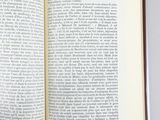an open book that is sitting on a table
