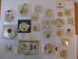 a lot of coins and other items that are on the table