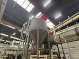 a large boat that is being built in a building