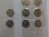 a lot of coins that are in a plastic bag