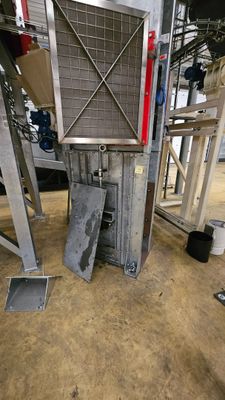 an image of a machine that is working on a piece of metal