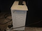 a white box with a phone on top of it on the floor