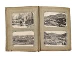 an old book with pictures of a town in it