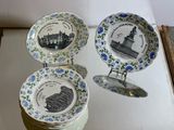 three plates that are sitting on top of a table