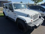 a picture of a white jeep parked in a parking lot