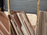 many pieces of cardboard stacked on top of each other