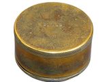 an image of a small brass box with a lid on a white background