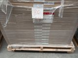 a pallet with a lot of boxes on it in a warehouse