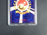 a close up of a pokemon trading card with a red ball on it