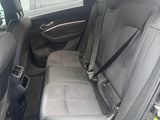 the back seats of a car with a seat belt in a car