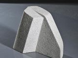 a concrete block sitting on top of a table