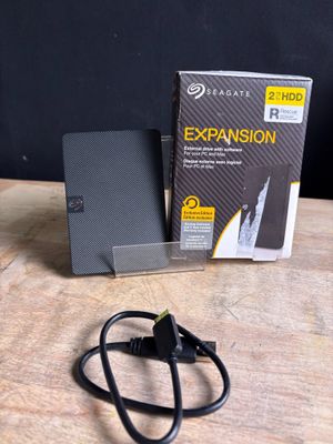a box and a pair of scissors sitting on a table
