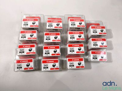 six cartridges of canon clr - 545 and clr - 545 ink cartridges on a white surface