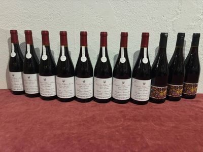 a group of bottles of wine sitting on top of a table