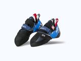 pair of blue and black climbing shoes on a white surface