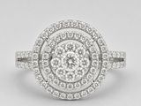 a close up of a diamond ring on a white background