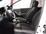 the interior of a car with a steering wheel and a dashboard
