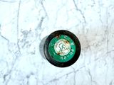 a bottle of beer on a marble counter top