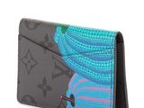 a close up of a black and blue wallet with a blue flower on it