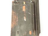 a piece of luggage sitting on top of a white surface