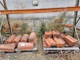 many different types of roof tiles on the pallets