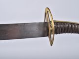 a close up of a sword on a white background