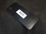 the back of a black samsung phone with a number on it