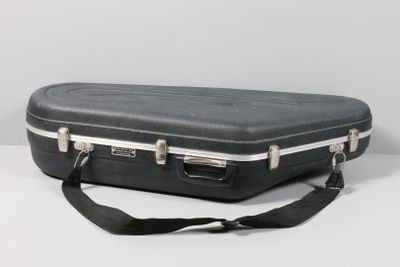 a black case that is sitting on a white table