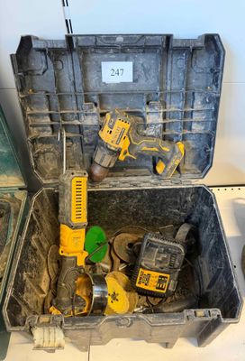 a tool box with tools inside of it on the floor