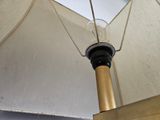 a close up view of an umbrella with a light bulb on it