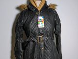 the jacket is black and has a fur collar on it