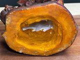 a close up of a piece of wood on a table