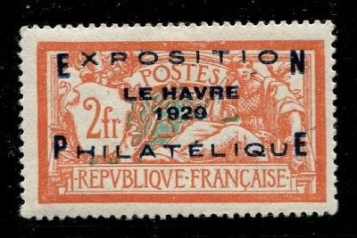 an orange and black stamp with a picture of a man on a horse