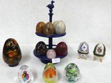 a lot of glass eggs on a stand on a table
