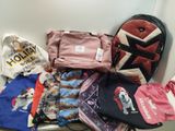 a pile of luggage sitting on the floor next to a wall